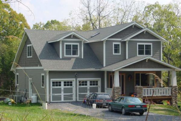 Large home with two-toned siding and new roof