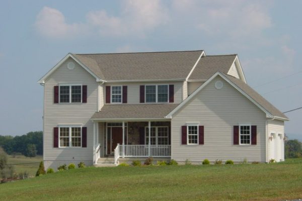 House with light siding and darker roof